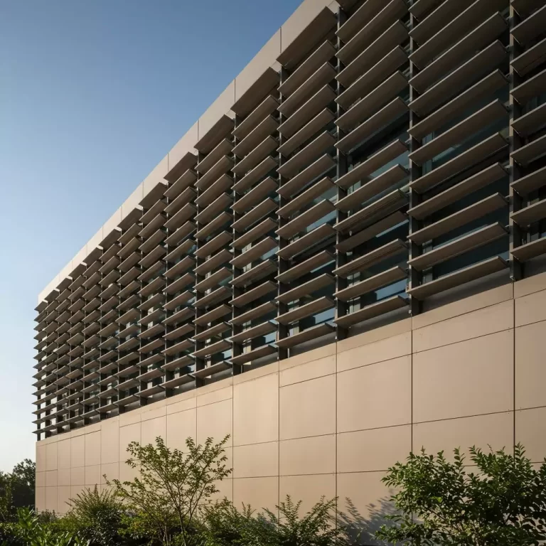 Fixed louvered wall in an industrial setting, showing durability